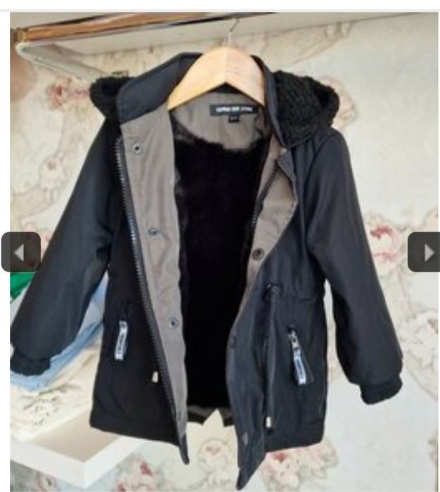 Зимна парка,дебела,мека и с естествен косъм на качулка.