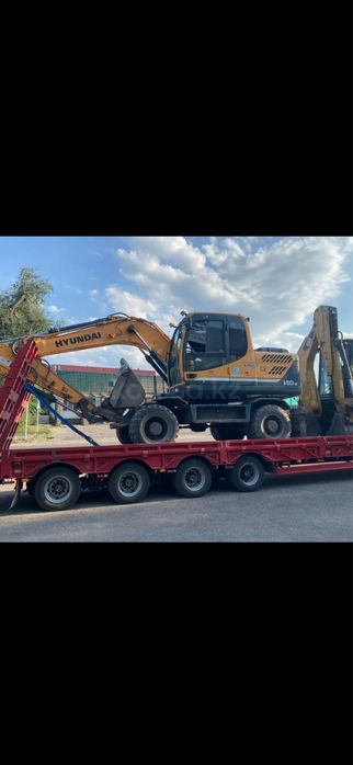 Услуги экскаватора. Погрузчик колесный