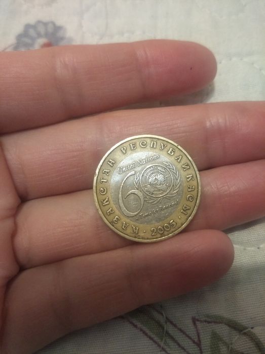 Монет 100 тенге  продам