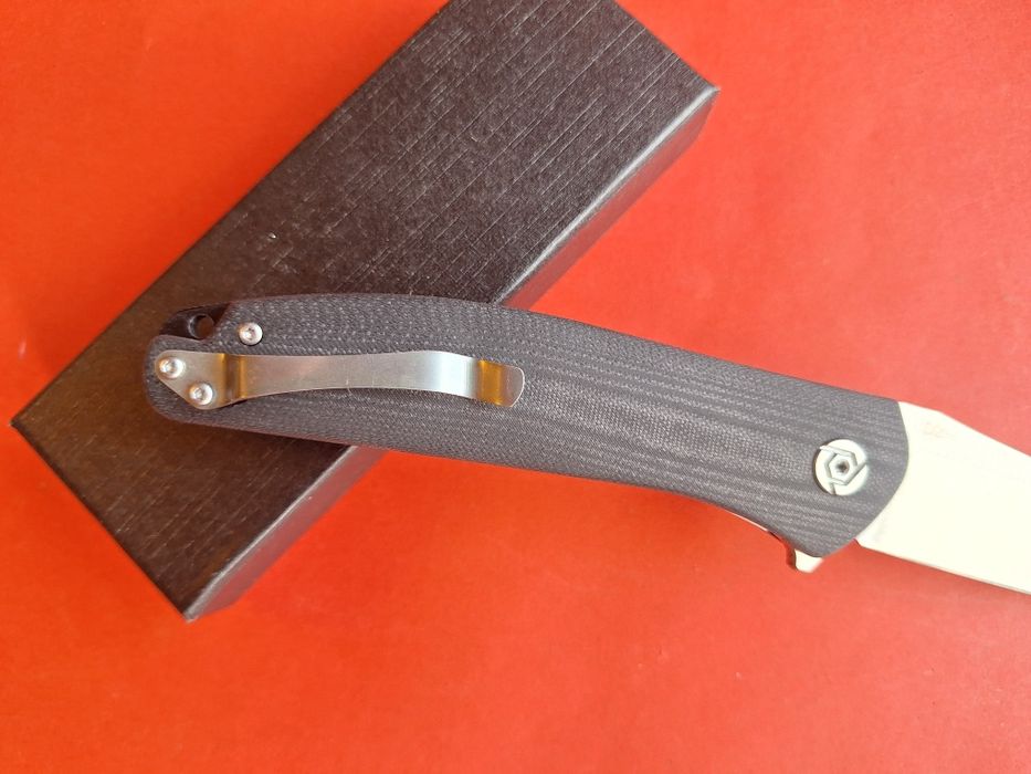 Сгъваем нож-стомана D2,дръжка G10
