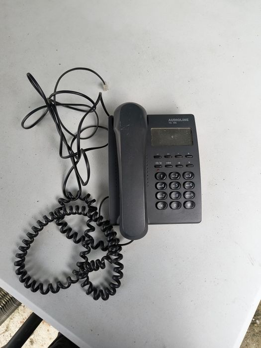 Telefoane fix  cu disc și butoane