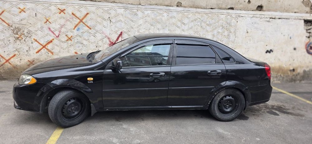 Lasetti 1.8 jentra qilingan 2010 metan