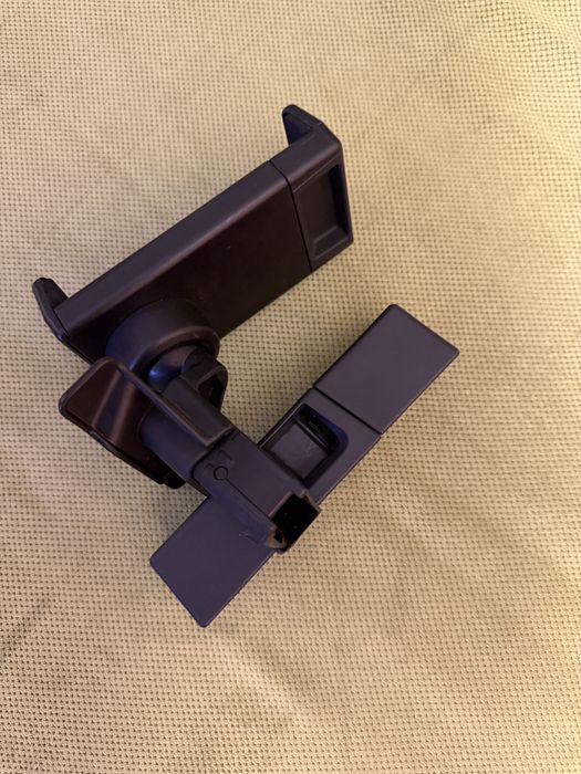 Suport telefon/tableta original pt tetiera auto