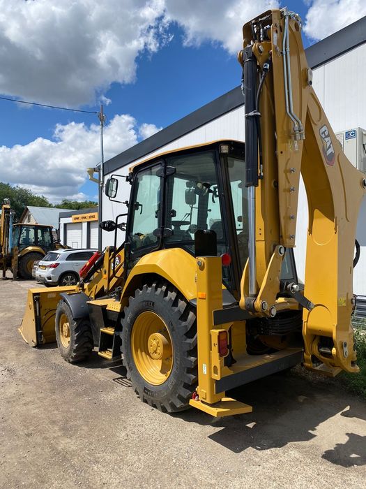 Экскаватор погрузчик Caterpillar 428 сборка Англия