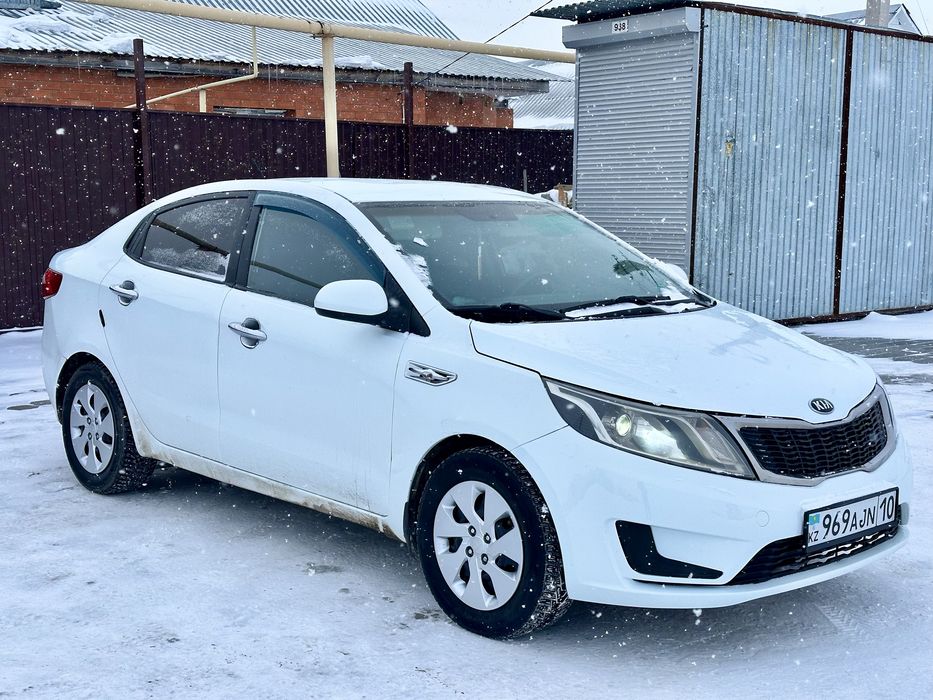 Kia Rio 1.4 MT 2014 год