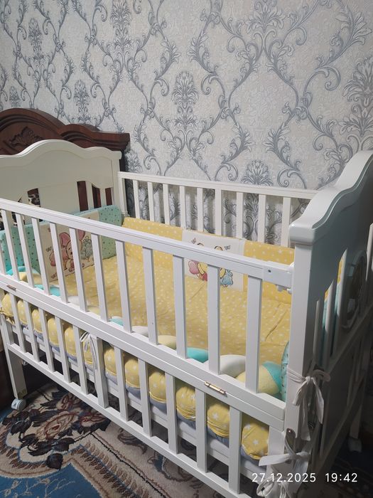 Детская кроватка с люлькой