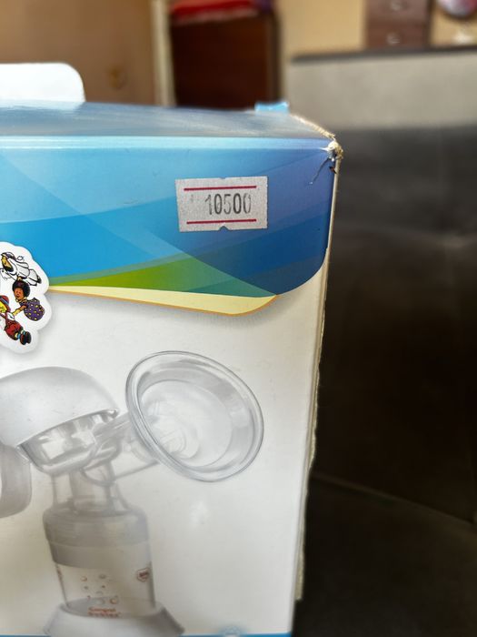 Молокоотсос ручной с принадлежностями