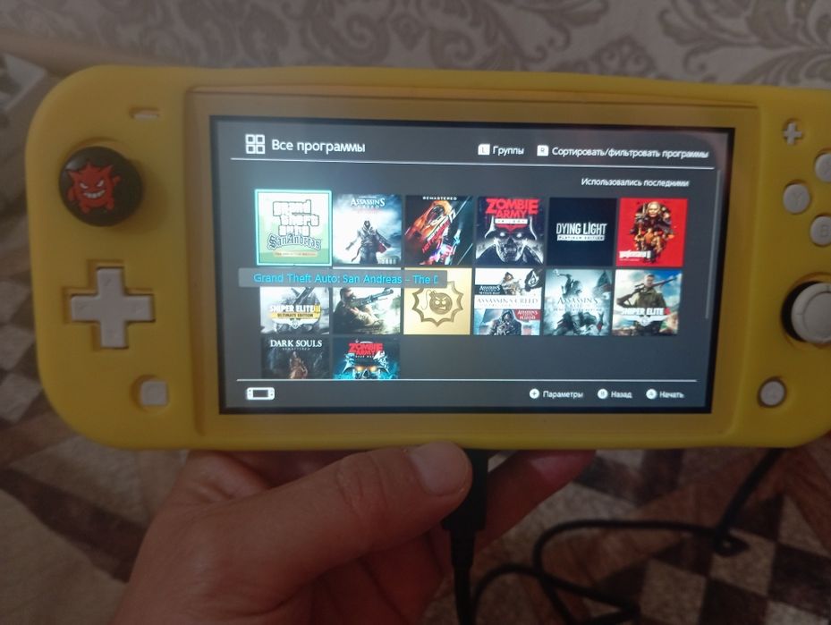 Nintendo switch lite в отличном состоянии,прошитая