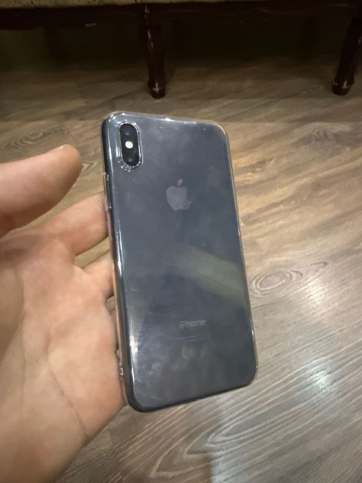 iPhone X 64 GB 100%