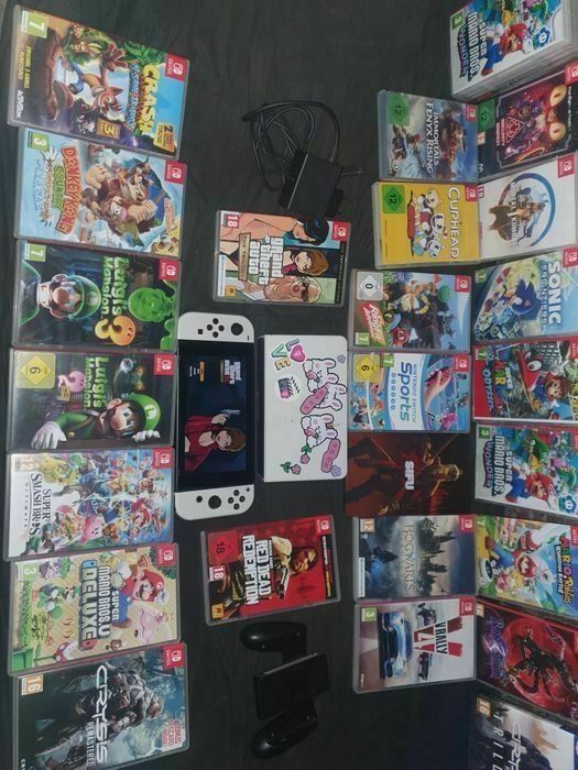 Vand NINTENDO SWITCH OLED MARIO cu 25 de jocuri