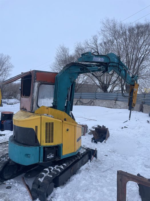 Мини экскаватор ямобур гидромолот