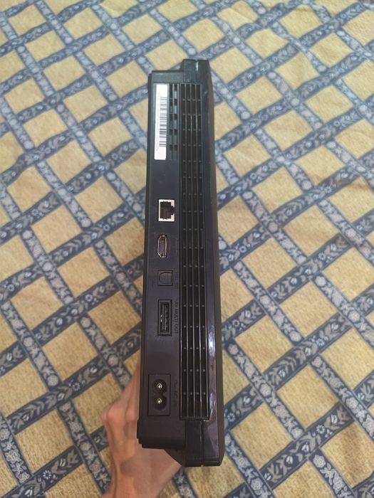 PlayStation 3 slim modat  2 controlere wireless cu foarte multe jocuri