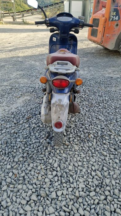 Aprilia  scarabeo 49cc si Honda Deauville 650cc v-twin