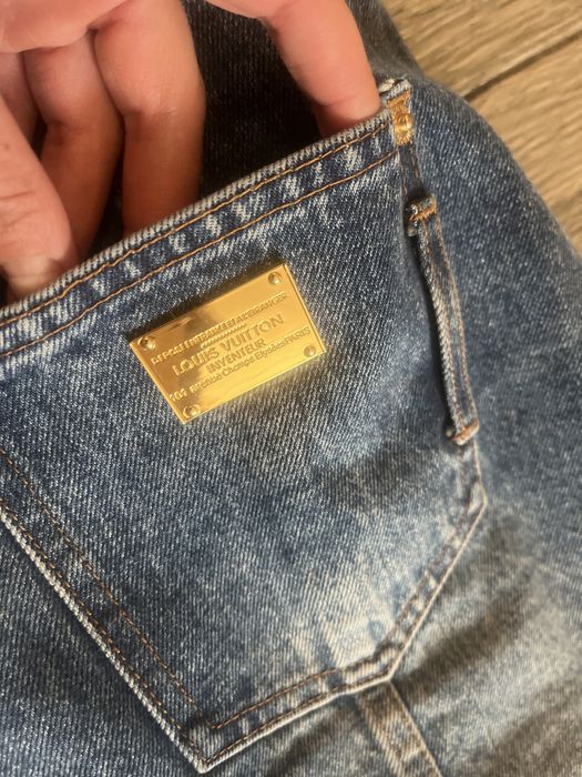 Дънкова пола с копчета и лого в златисто