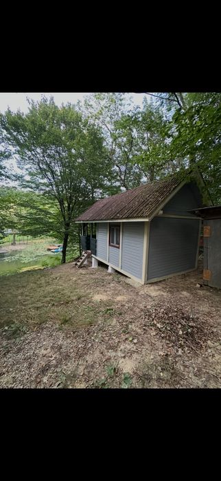 Cabana/Casuta din lemn Lac mujdeni cu ponton privat pe lac !