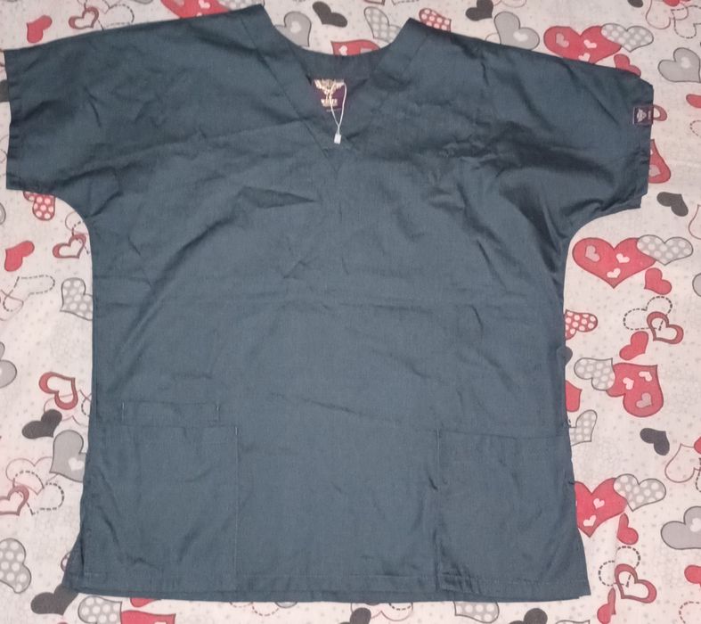 Vănd costum medical verde închis  nou.