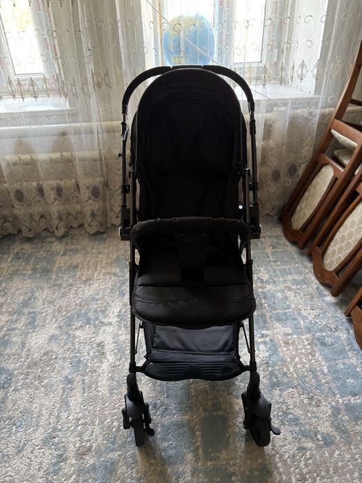 Продам коляску и ходунок