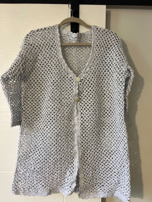 Плетени жилетки и шапки