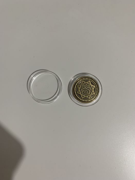 Монета от банка центр кредит Юбилейная "на удачу" / "сәттілік акелсін"