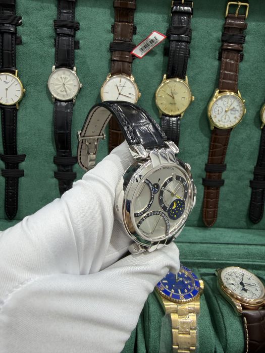 Золотые часыHarry Winston Premier Perpetual Calendar 18k