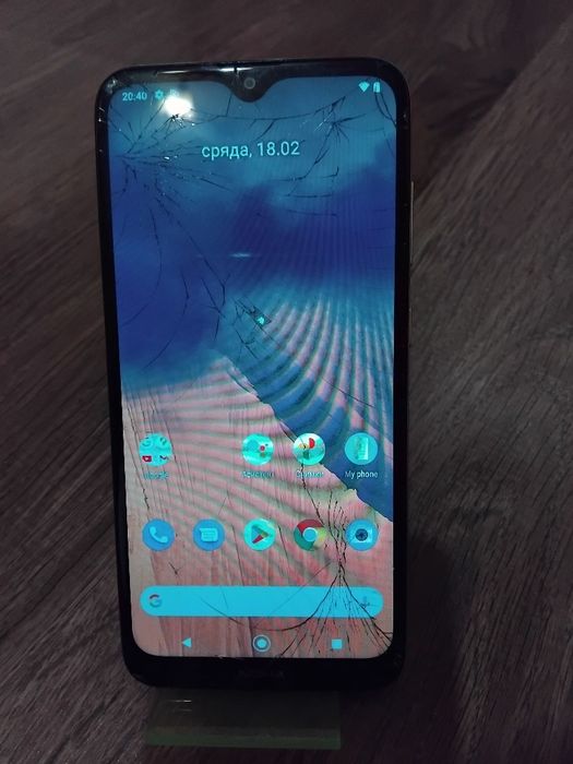 Телефони за части