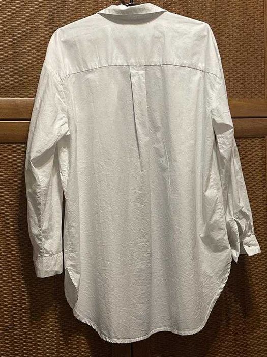 Бяла ризка Reserved