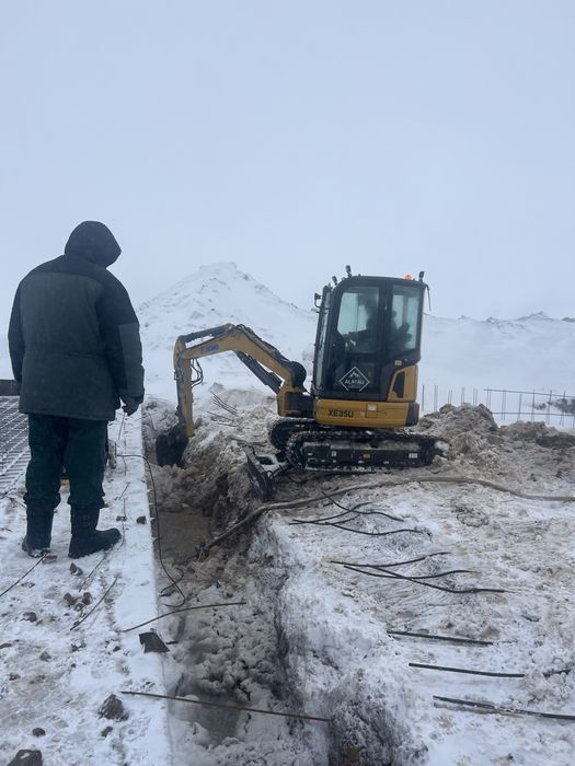 Услуги мини эксковатора. Блоха.