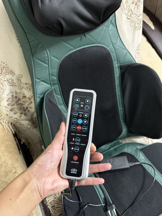 Массажный кресло