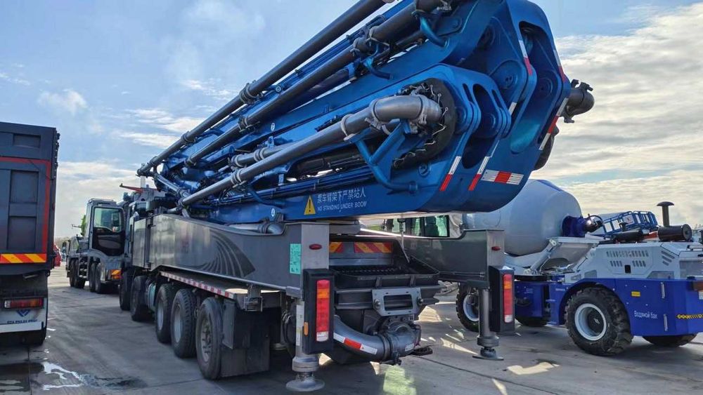 Бетононасос Новый или б/у JIUHE 38 метр на шасси HOWO TX