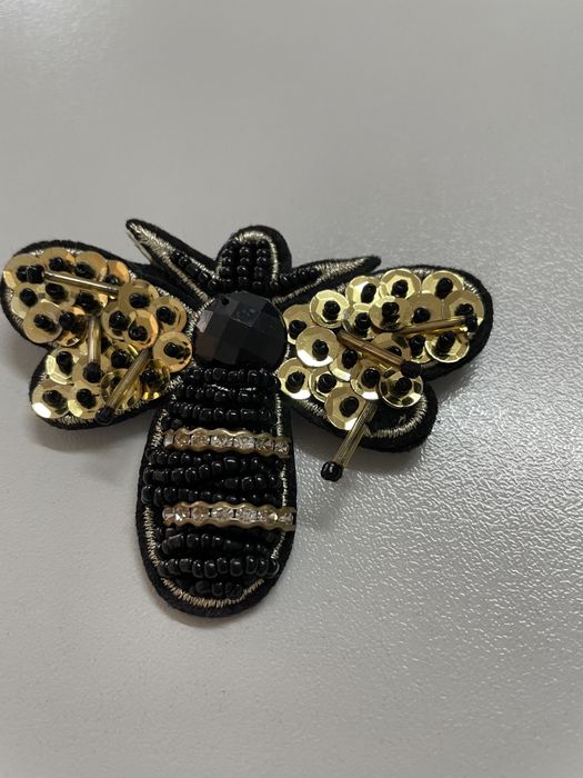 Брошка за дреха