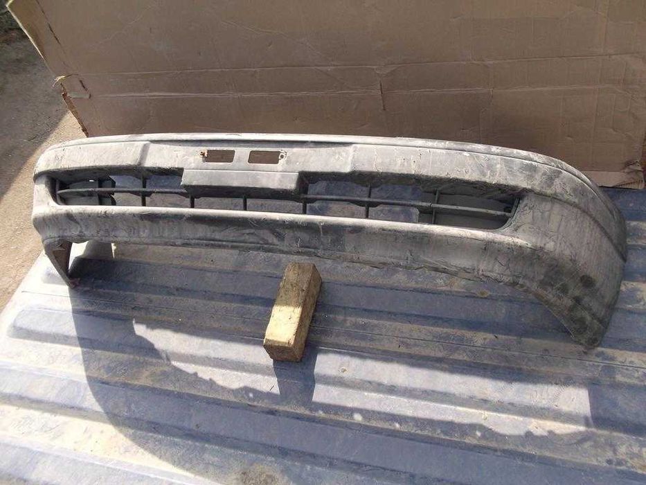 Бампер передний оригинал Toyota Carina E