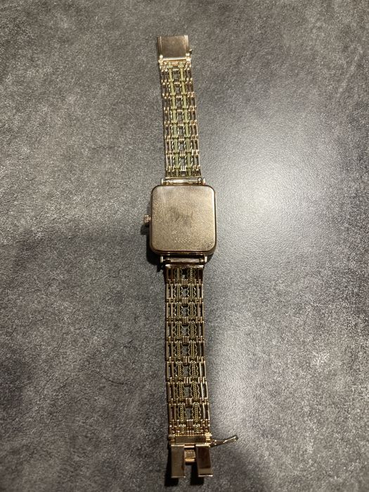 часы золотые ника