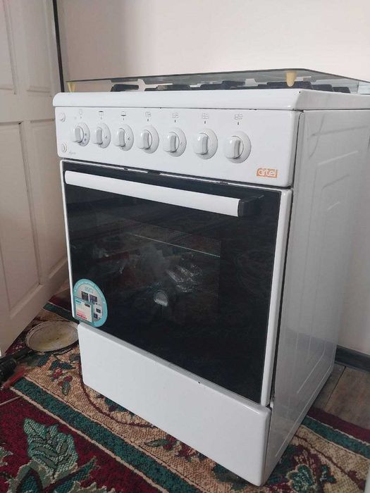 Продам газовую плиту Artel