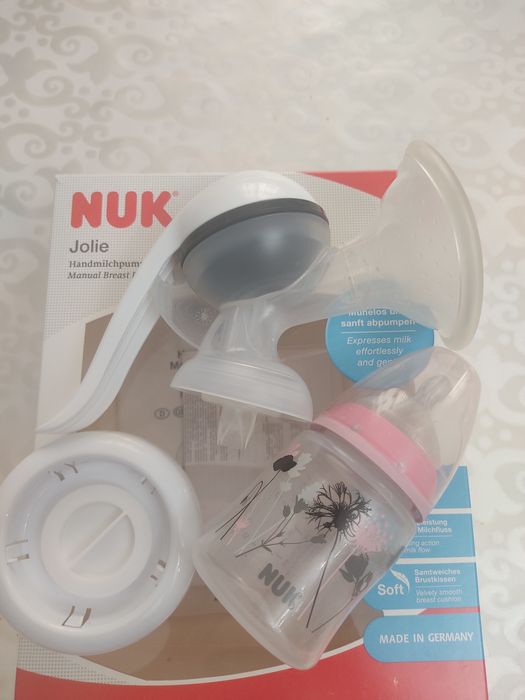 Молокоотсос фирма NUK