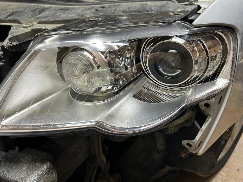 Стекло Фары Volkswagen Passat B6