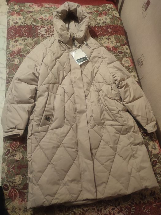 Продам новый пуховик