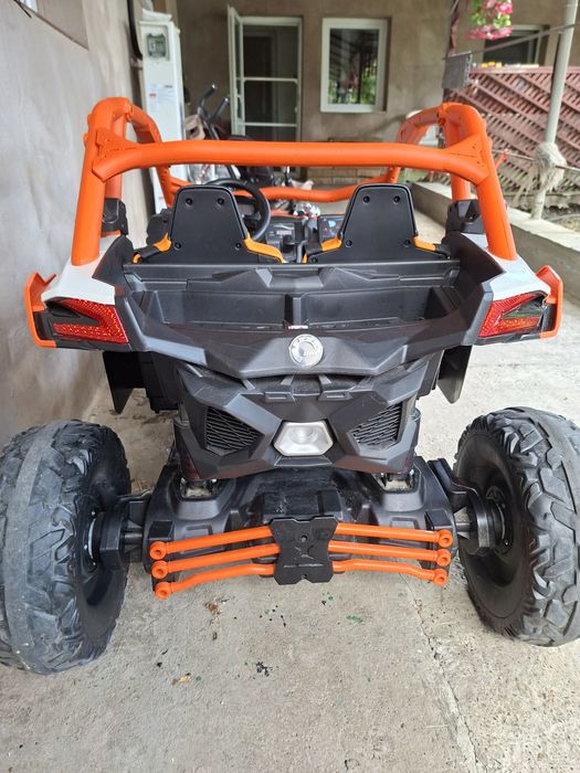 Masinuta UTV electric Premier 4x4 Can-Am Maverick Power RC, 2 locuri, 2 baterii 24V, roti cauciuc EVA, scaun piele ecologica, portocaliu