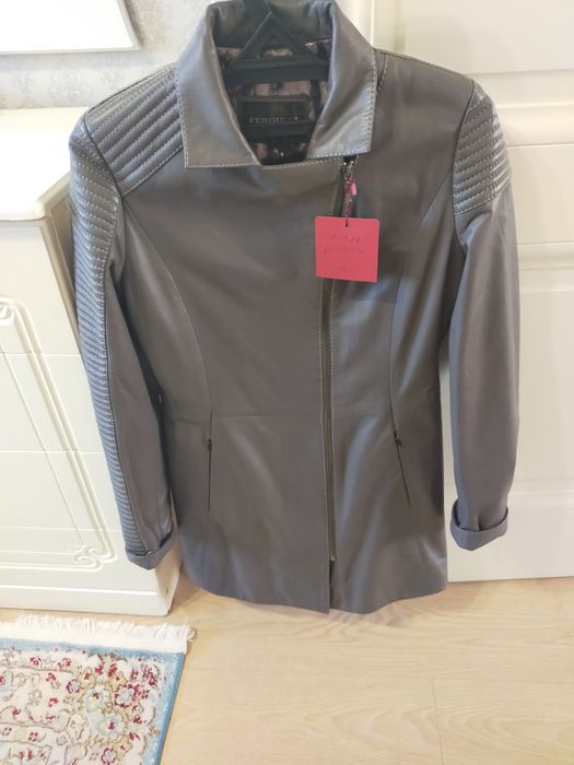 Плащь женский новый, кожанный