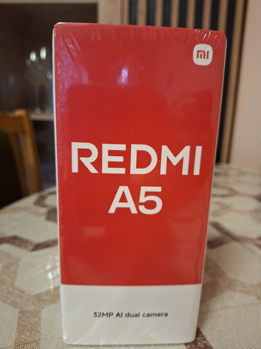 Продавам нов  Телефон REDMI A5