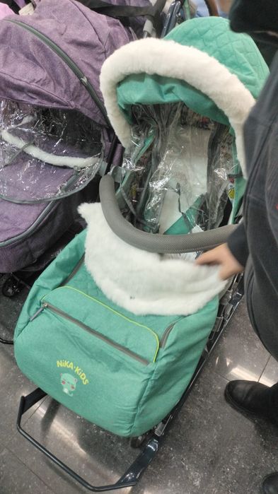 Детская сани-коляска