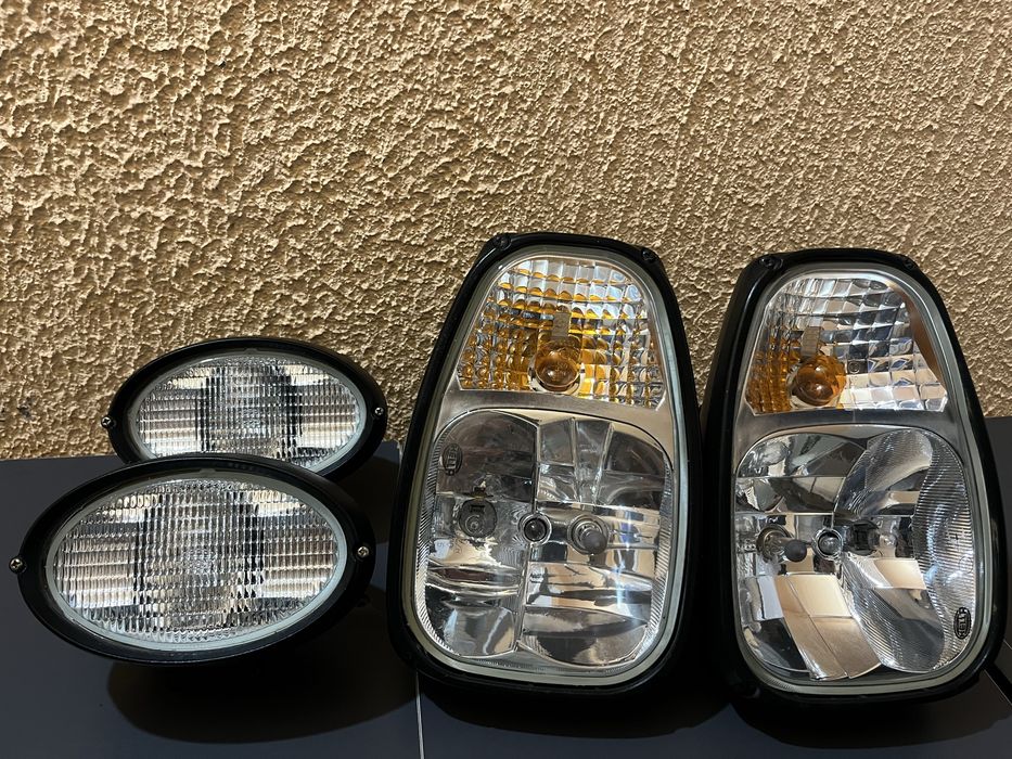 Set faruri si proiectoare buldoexcavator Hella