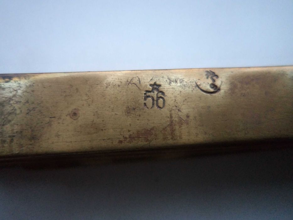 Стар бронзов сгъваем метър