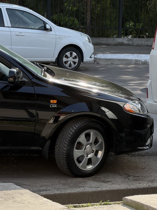 Chevrolet Gentra - 3-поз Elegant Plus Full (Своя)