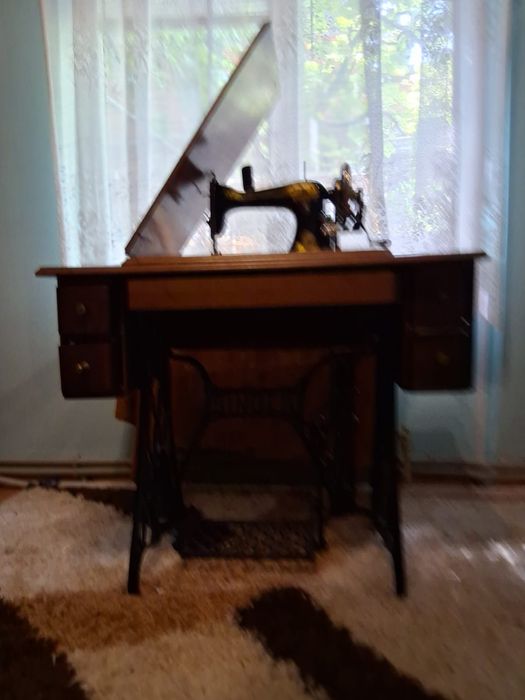 Mașină de cusut Singer