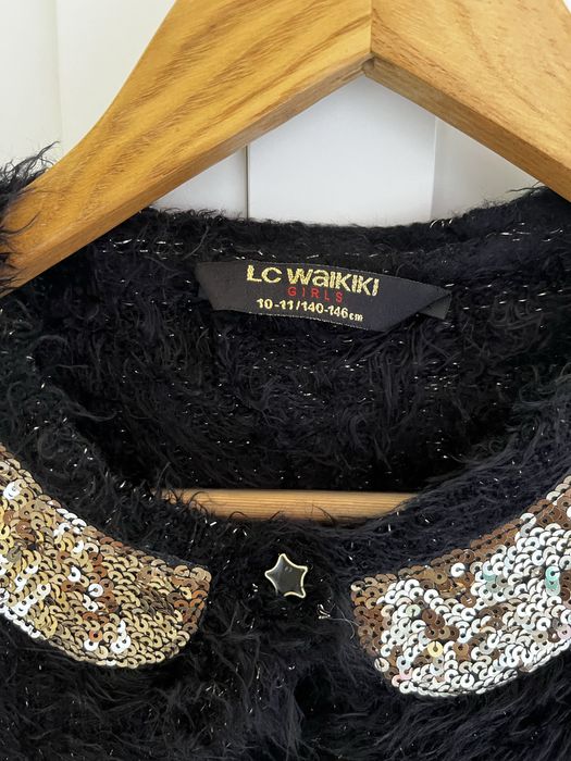 Пухкава жилетка LC WAIKIKI