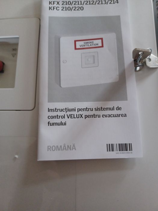 Sistem de control pentru evacuarea fumului Velux