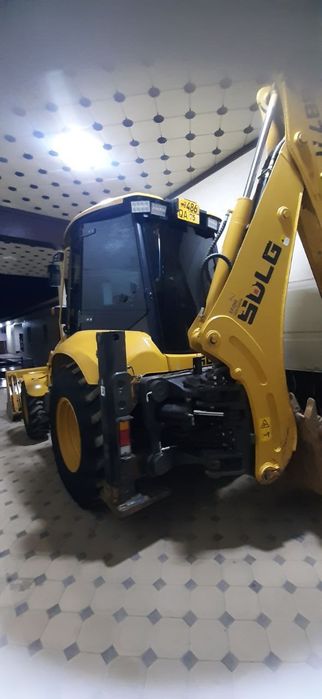 Экскаватор погрузчик Volvo SDLG