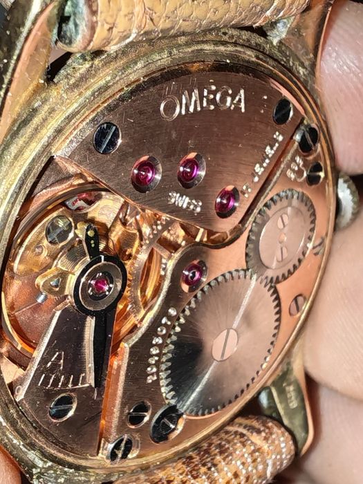 Ceasuri aur Omega Longines