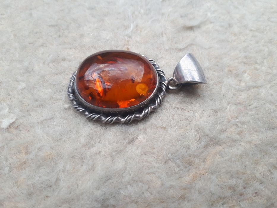 Серебряный кулон.