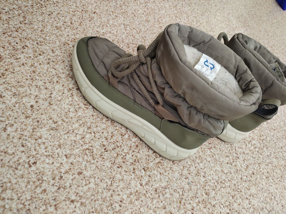 Женьская зимныи обувь